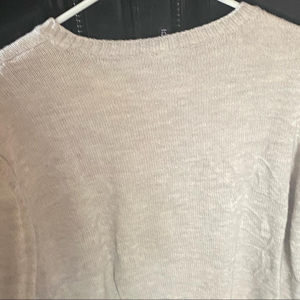 Sweater size small but can fit medium as well